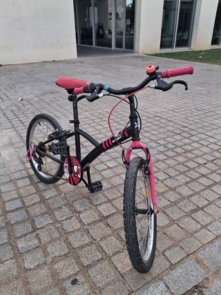 Bicicleta niña rosa y negra
