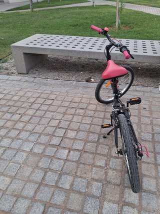 Bicicleta niña rosa y negra
