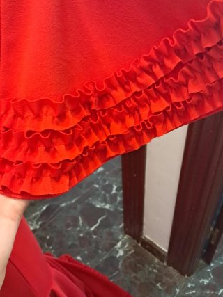 Traje de flamenca rojo con mantón