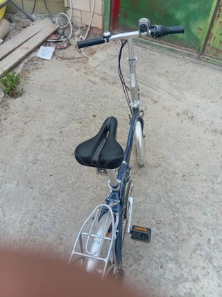 Bicicleta plegable azul marca conor como nueva