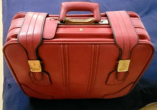 Maleta de viaje roja vintage