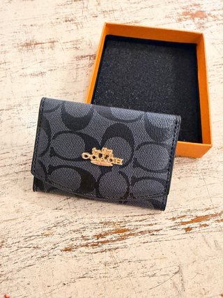 Monedero Coach gris con logo