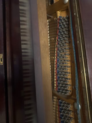 Piano vertical madera oscura