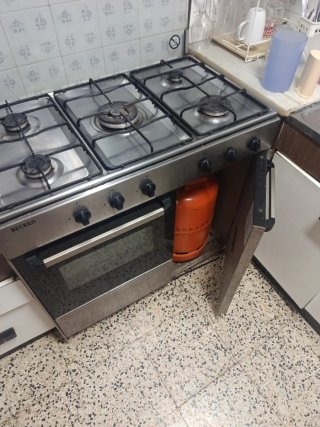 Cocina de Gas Butano con horno Becken Solo recogid