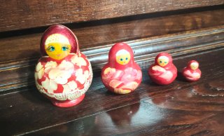 Set 4 Matrioske Rosse con Fiori
