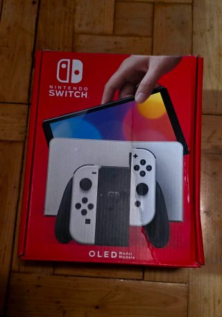 Nintendo Switch OLED + Accesorios y Juegos