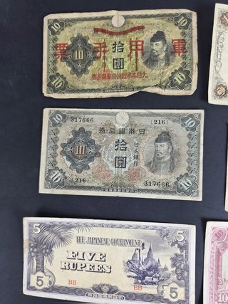 Lote 14 billetes y bonos japoneses históricos
