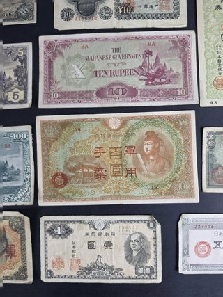 Lote 14 billetes y bonos japoneses históricos