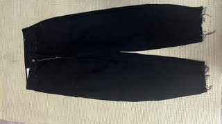 Jeans neri a gamba larga
