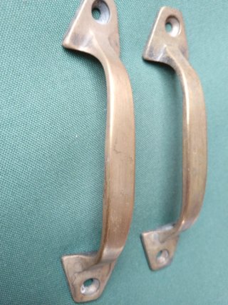 Pareja de tiradores/manillones antiguos de 11 cm