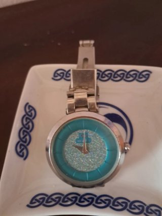 Reloj Marea Azul Purpurina