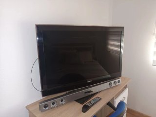 Televisión Samsung y Barra de Sonido LG