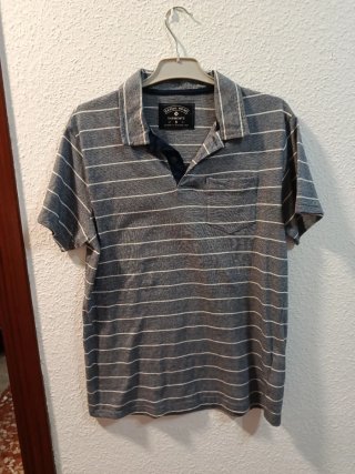Polo de rayas azul
