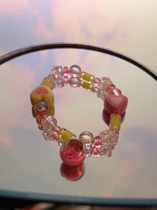 Pulsera de corazones y cuentas