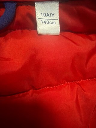 Plumas niño talla 140 cm