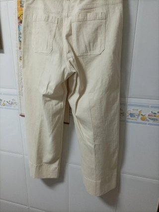 Pantalón crema talla 48 wide leg