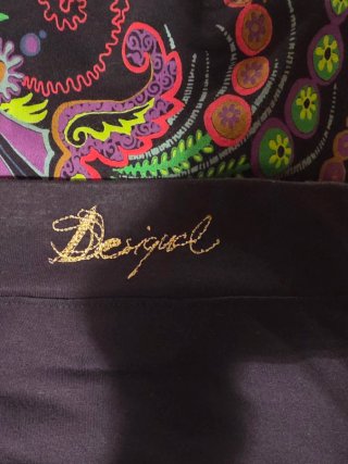 Falda Desigual Negra Estampada