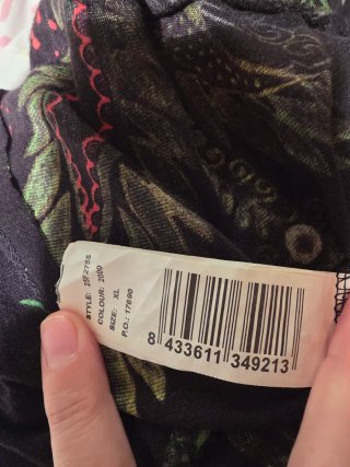 Falda Desigual Negra Estampada