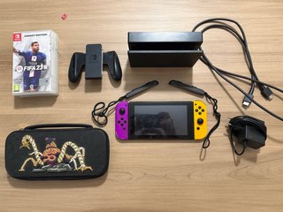 Nintendo Switch con Joy-Con Morado y Amarillo