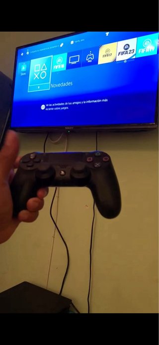PlayStation 4 (PS4) con 2 mandos