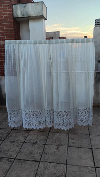 Cortinas blancas con encaje