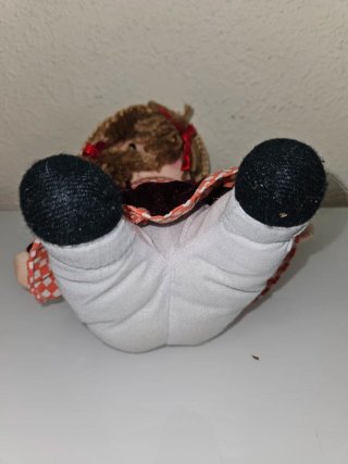 Muñeca de trapo con sombrero de paja