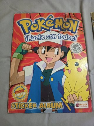 2 Álbumes de Pokémon Merlin 1999.