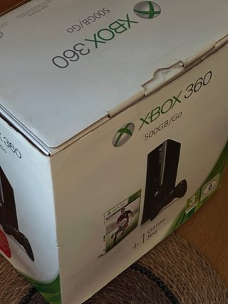 Xbox 360 E Negra 500g más 4 juegos