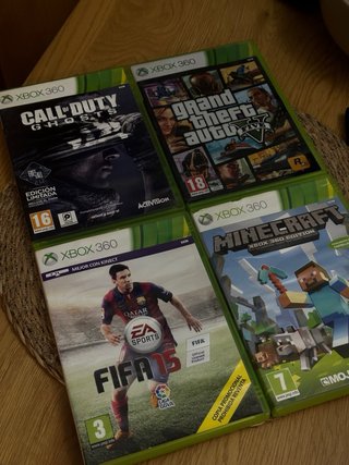 Xbox 360 E Negra 500g más 4 juegos
