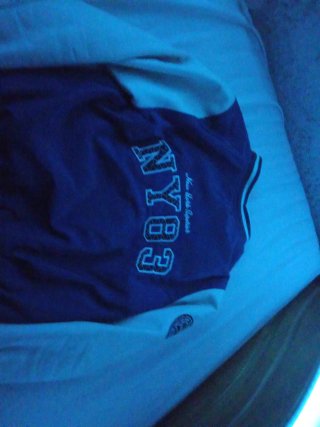 Chaqueta de béisbol azul y blanca