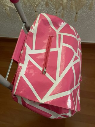 Carro de la compra rosa y blanco