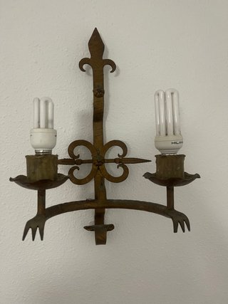 Candelabro de pared  de metal dorado y marrón