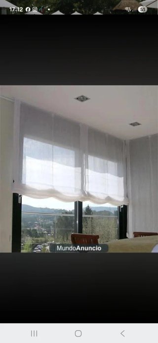 Servicios de instalacion de estores,  cortinas.