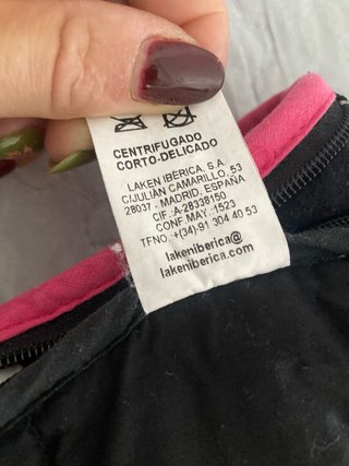 Saco de bebé rosa y negro