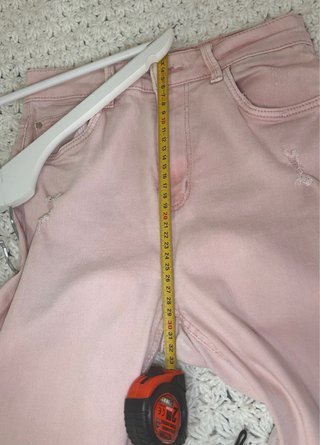 Pantalones vaqueros rotos rosas