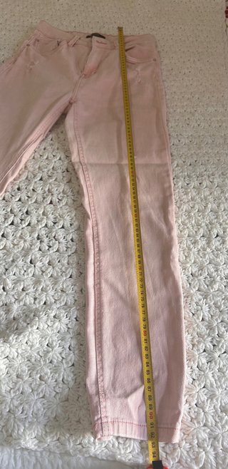 Pantalones vaqueros rotos rosas