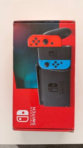 Nintendo Switch Rojo y Azul con juego  Super Mario