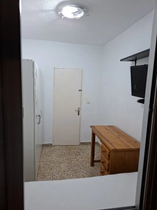 Habitación amueblada