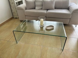 Mesa de centro de cristal curvado