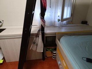 Cama doble con escritorio