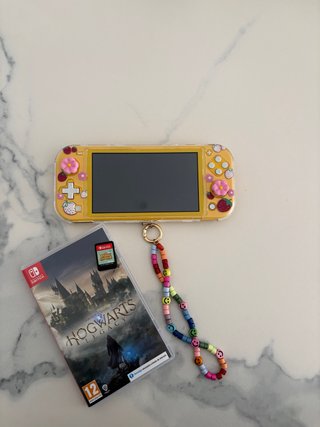Nintendo Switch Lite + 2 Giochi
