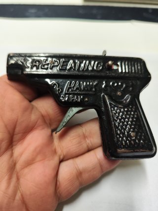 Pistola giocattolo in latta anni 60