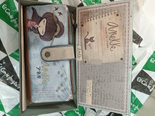 Monedero Anelle estampado floral y marrón
