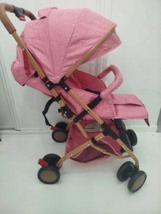 Silla de paseo rosa para bebé