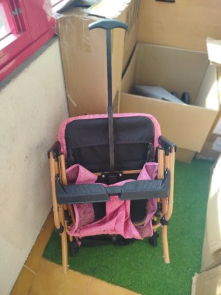 Silla de paseo rosa para bebé