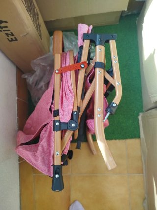 Silla de paseo rosa para bebé