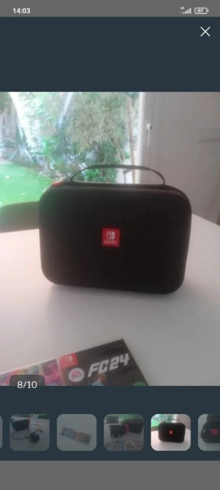 Nintendo Switch con 5 juegos y maleta