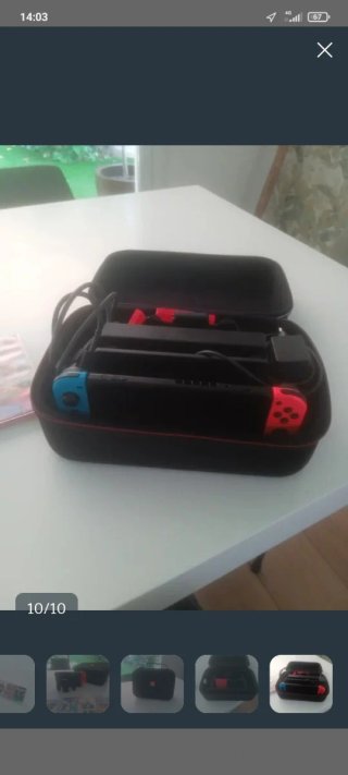 Nintendo Switch con 5 juegos y maleta
