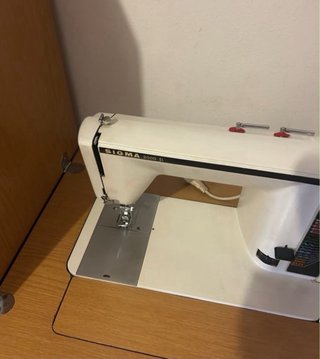 Máquina de coser eléctrica vintage