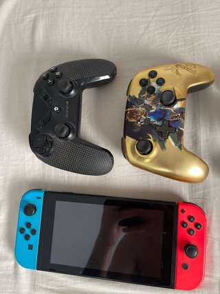 Nintendo Switch +2 mandos, juegos y todo incluido